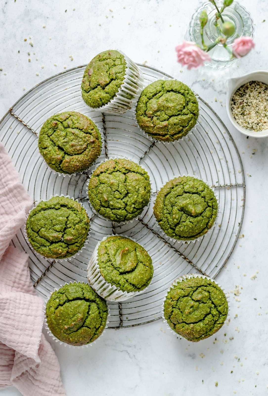 banana spinach muffins on a wire rack