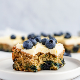 slice of healthy blueberry zucchini cake on a plate