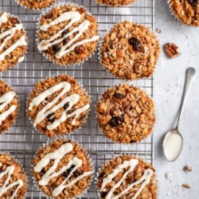 carrot cake baked oatmeal cups on a wire rack