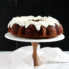 carrot zucchini cake on a cake stand