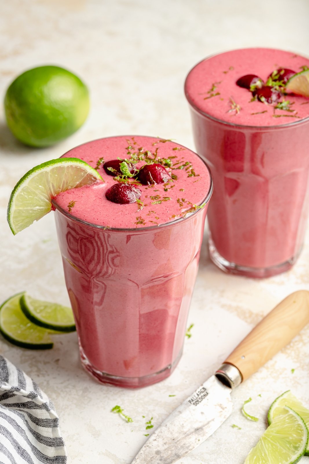 cherry lime smoothie in two glasses