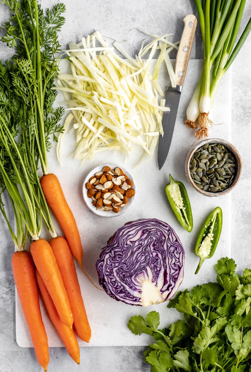 coleslaw ingredients on a cutting board