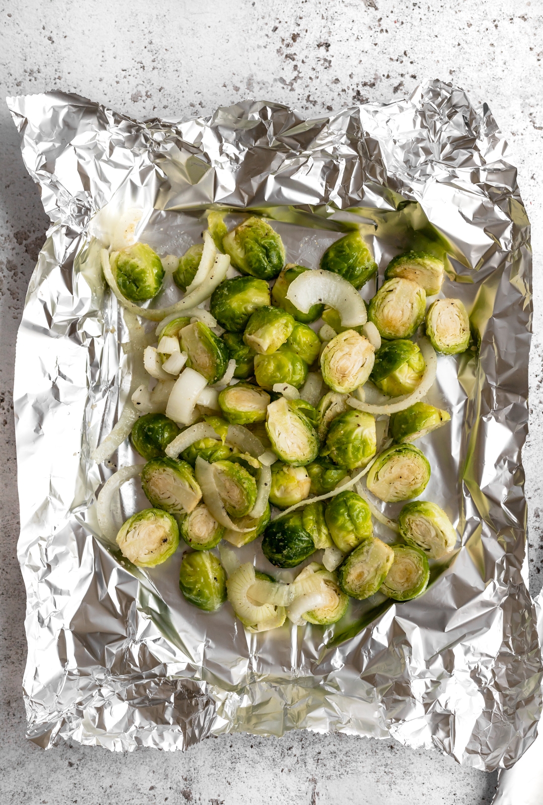 foil pack grilled brussels sprouts with onion