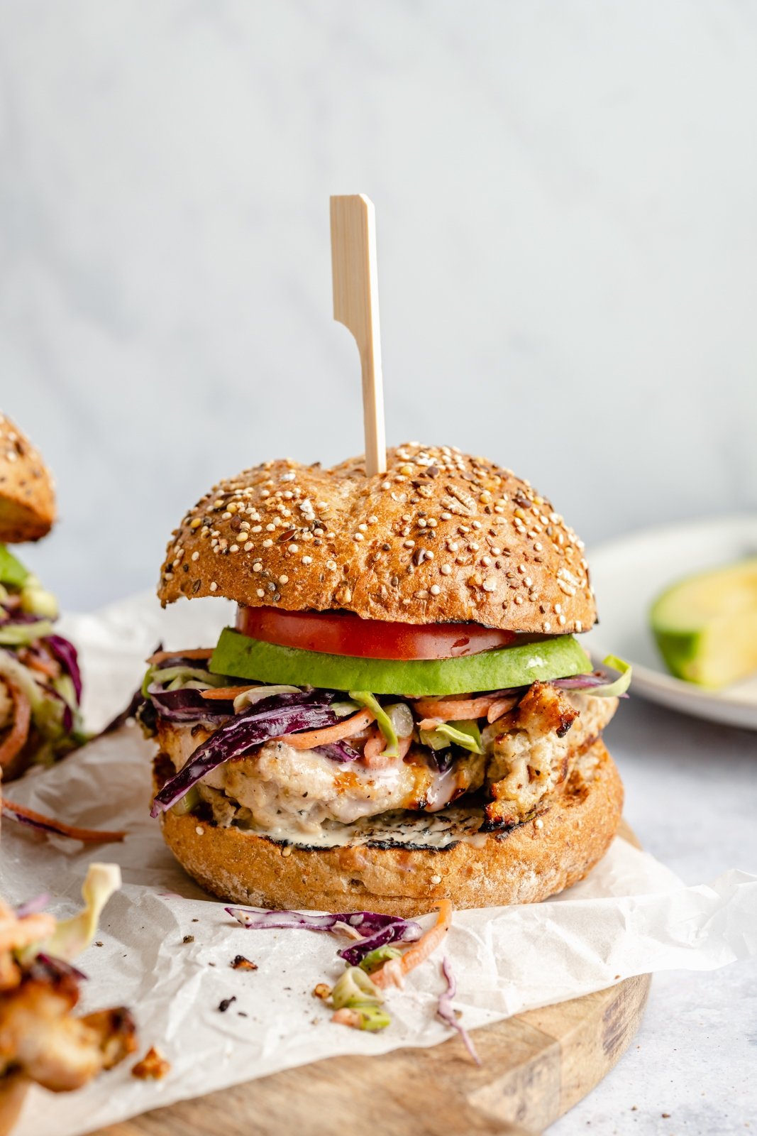 easy grilled chicken caesar sandwiches on parchment paper