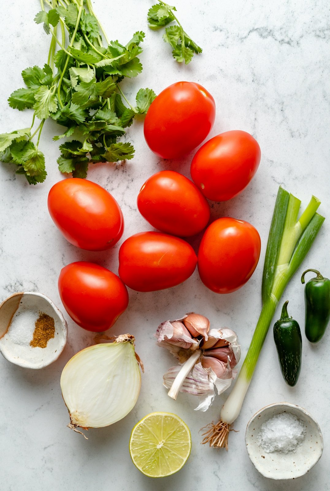 ingredients for easy homemade salsa on a board