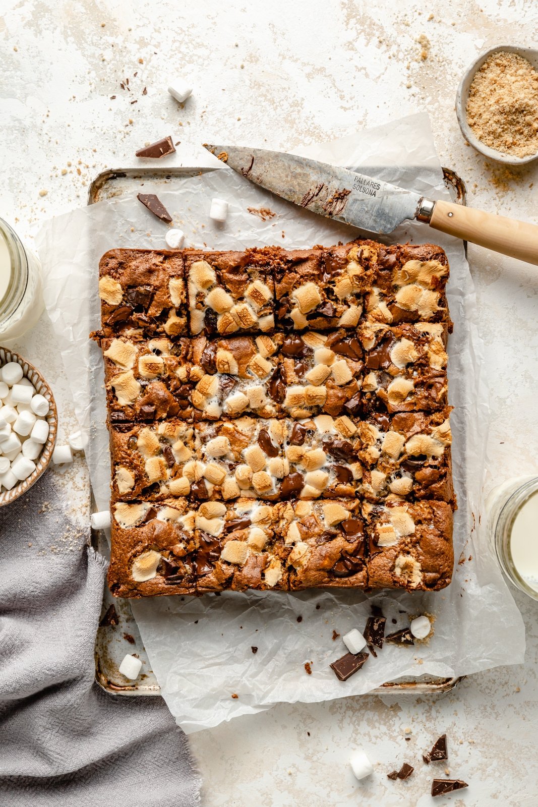 tahini s'mores bars sliced on parchment paper