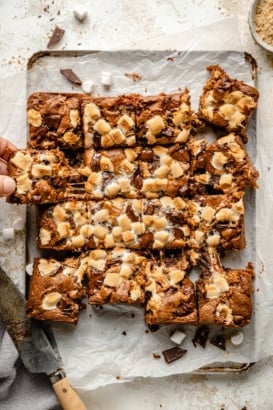 tahini s'mores bars sliced on parchment paper