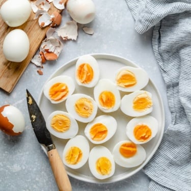 perfect hard boiled eggs sliced on a plate