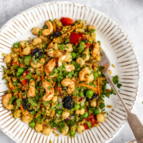 vibrant curry chickpea quinoa salad on a plate