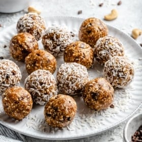 coconut cashew energy bites on a plate