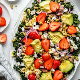 strawberry kale salad on a platter