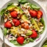 strawberry spinach salad in a bowl