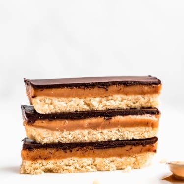 three healthy homemade twix bars stacked on top of eachother