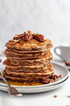 stack of healthy zucchini pancakes on a plate