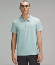 man in a light blue polo